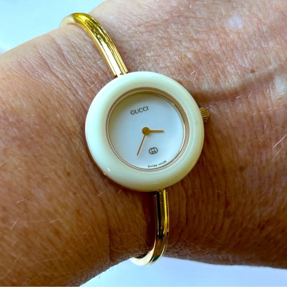 GUCCI 14k Gold Plated Bezel Bracelet Watch comes with all bezels shown
